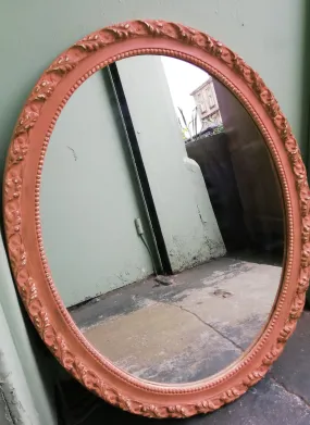 Ornate vintage mirror frame painted in Scandinavian Pink by Annie Sloan